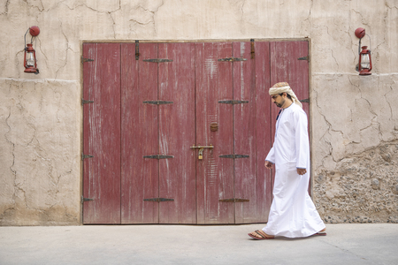 arab man in old Al Seef part of Dubai, United Arab Emiratesの写真素材