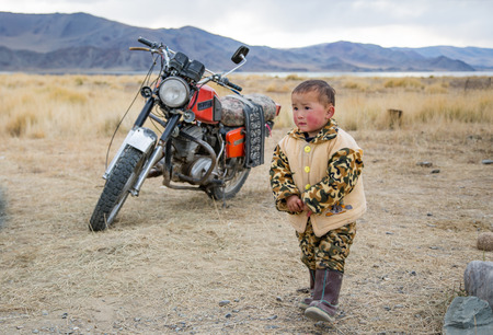 Bayan Olgii, Mongolia, September 2015:  young mongolian boy playing outdoorsのeditorial素材