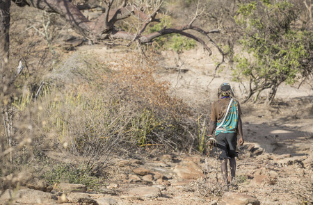 Lake Eyasi, Tanzania, 11th September 2019: Hadzabe men out hunting - for birs, rodens, honey or gameのeditorial素材