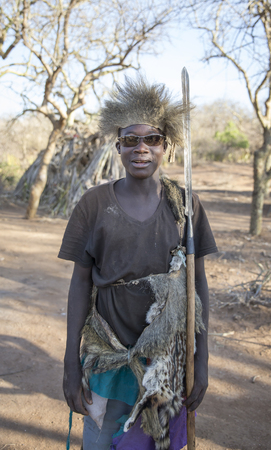 Lake Eyasi, Tanzania, 11th September 2019: Hadzabe man with sunglasses