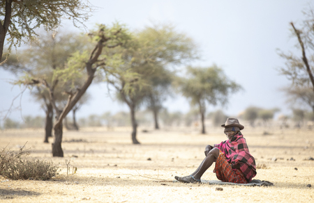 Arusha, Tanzania, 7th September 2019: Old Maasai man in traditional clothing