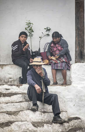 chichicastenango, Guatemala, 27th February 2020: mayan people at the traditional market selling and buying craftsのeditorial素材