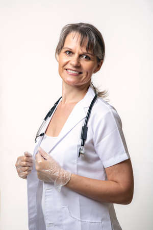 Portrait of middle aged female doctorの写真素材