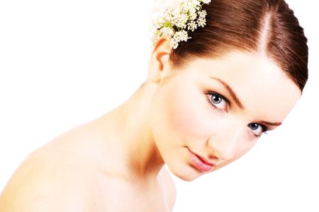 A close up of a beautiful bride in front of a white background.の写真素材