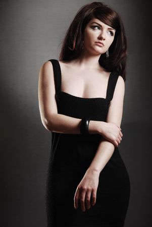 Attractive / Funky 60's retro woman on dark backroundの写真素材