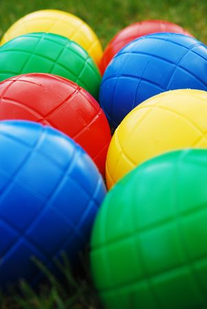 Vibrant Multi-coloured balls on grassの写真素材