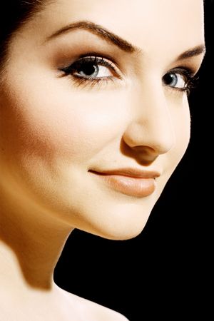 A close up of a beautiful young woman looking at the camera.の写真素材
