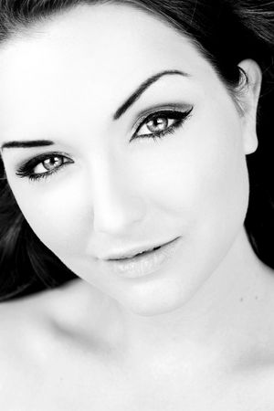 A beautiful young woman looking at the camera. Black and white.の写真素材