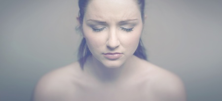 A soft vintage panoramic portrait of a sad woman.の写真素材