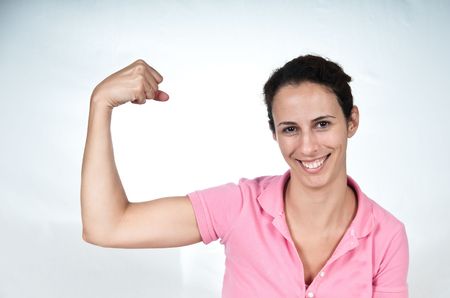 smiling woman, flexing her bicep muscle