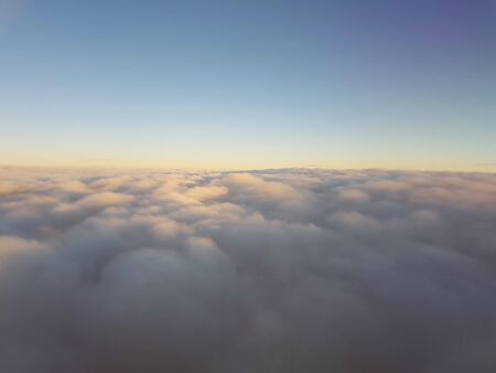 Above the clouds. Landscape skyline without focus.