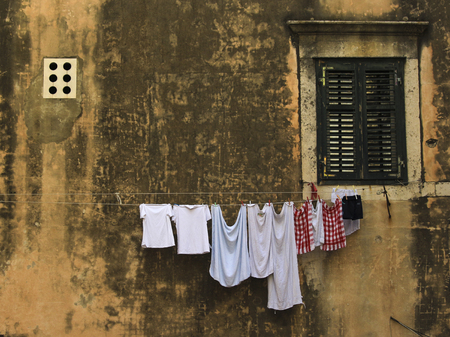 Expanded clothes on the wall of a medieval house