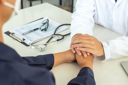 Doctor healthcare. Professional medical doctor in white uniform gown coat interview consulting...