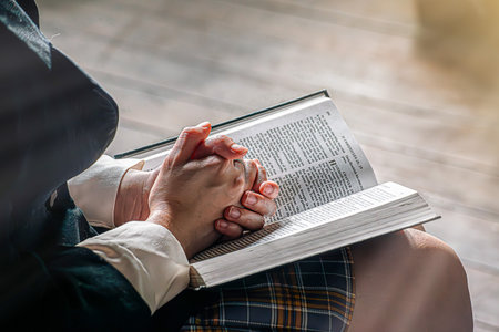 Christian life crisis prayer to god. top view of Woman holding hands pray for god blessing to...
