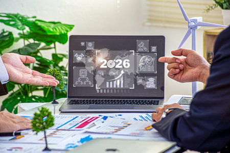 Businessman plan strategy marketing and finance to goal in 2026 planning business growth with...