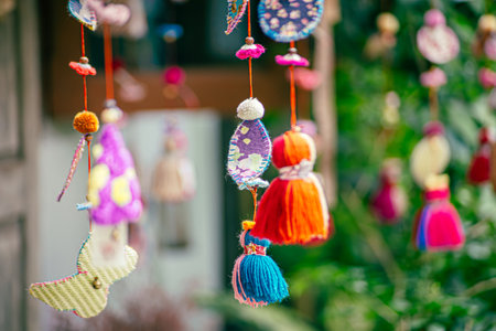 Colorful traditional Turkish crafts, including evil eye amulets and ceramic ornaments, displayed at...