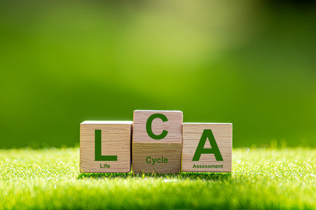 Growing sustainability. LCA-Life cycle assessment concept.LCA Text on a woodblock with a green ball....