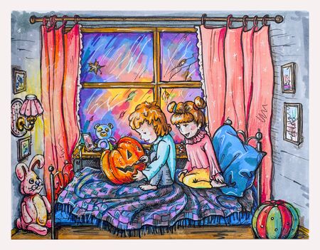 children carve a pumpkin for Halloween during a thunderstormの写真素材