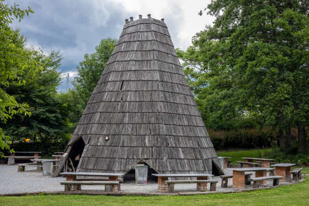 A tourist picnic/grill/BBQ wooden pavillon, Wojslawice Arboretum, Poland.