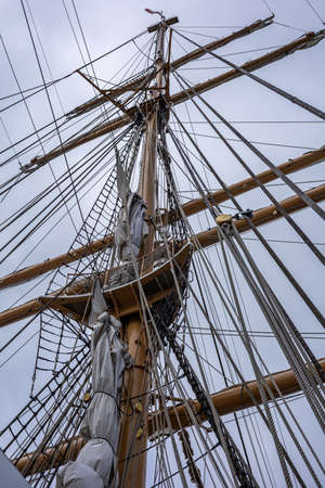 REYKJAVIK, ICELAND - June 11, 2021:
Main mast, crow's nest, sails, yards and rigging ropes on the deck of US coastguard tallship Eagle visiting Reykjavik Harbour.のeditorial素材