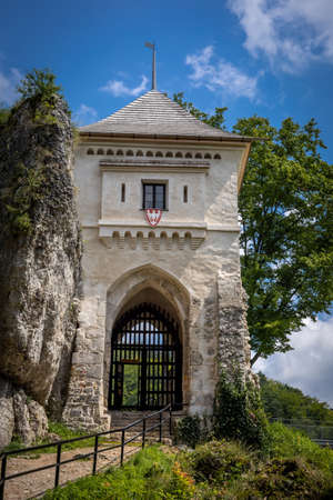 Ojcow, Poland - August 2, 2021:
Entrance gate to the Ojcow castle. These are ruins of a 14th century stronghold, part of a system of castles known as an Eagle's Nests.のeditorial素材