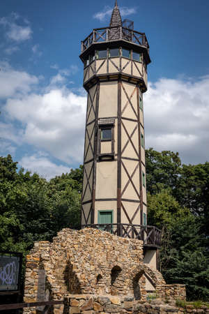 Gromnik, Poland - August 11, 2021:
Observation tower and medieval castle ruins at the top of the Gromnik mountain, Poland.のeditorial素材