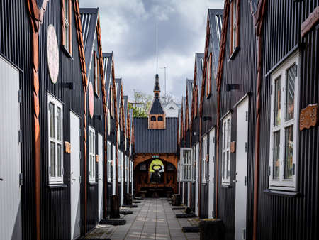 Hafnarfjordur, Iceland - July 17, 2021: Row of wooden cabins in the Viking hotel in Hafnarfjordur town. Traditional, viking style architecture.のeditorial素材