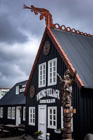 Hafnarfjordur, Iceland - July 17, 2021: A facade of the Viking hotel in Hafnarfjordur town. Traditional, viking style wooden architecture.のeditorial素材