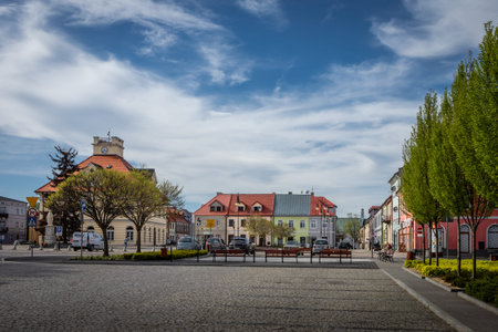 Leczyca, Poland - May 10, 2021: Old town market square. Town hall and historical residential...