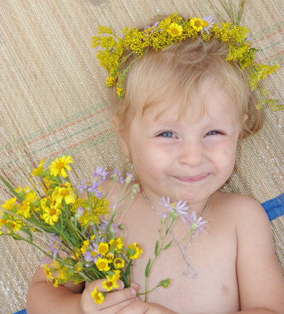 The girl with a bunch of flowers                               の写真素材