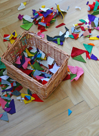 mess left on the floor after small children playing with tools for crafting