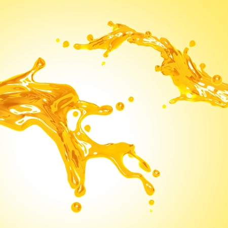 couple of orange juice yellow dynamic liquid splashの写真素材
