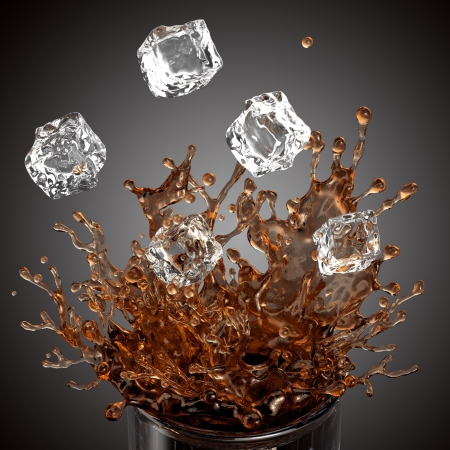 splashing drink, glass, falling ice cubes, isolated on white backgroundの写真素材