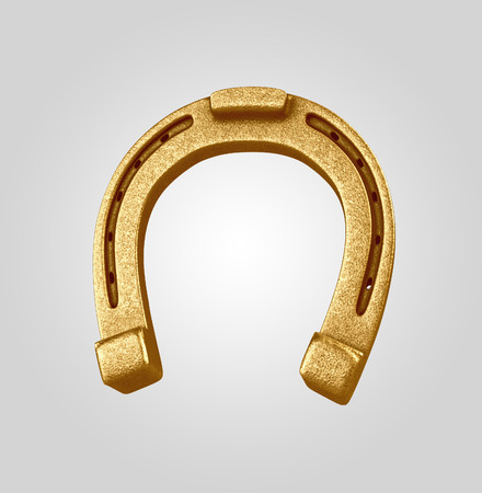 golden horseshoe, 3d object isolated on white backgroundの写真素材