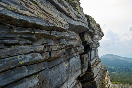 Mountains resembling a stone city, consisting of huge piles of stone books.