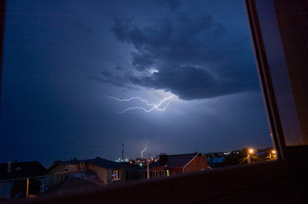 Powerful lightning during thunderstorm, bright lightning in the sky during a thunderstorm.