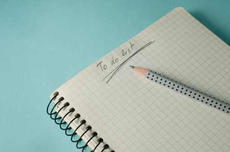 To do list - writing in a notebookの写真素材