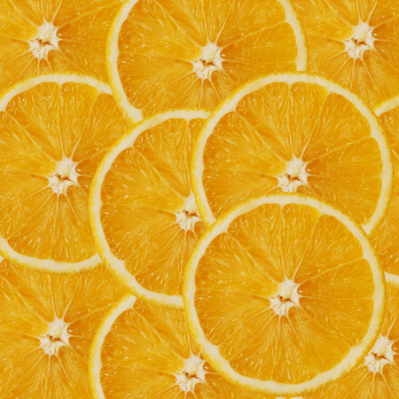 Fresh orange slices background.の写真素材