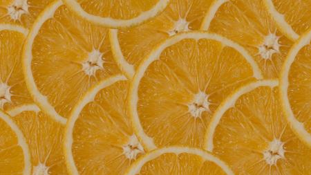Fresh orange slices background.の写真素材