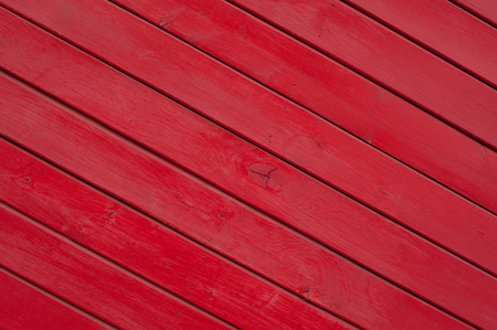 Red painted wooden planks texture for backgroundの写真素材