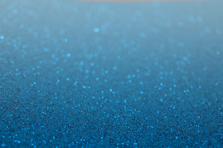 blue glitter bokeh backgroundの写真素材