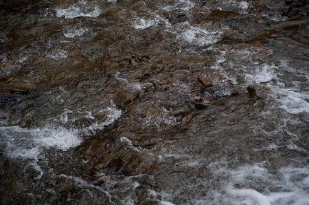 Mountain river, water rapids, waterfall backgroundの写真素材