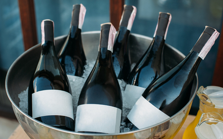 Bottles of wine in an ice bowlの写真素材