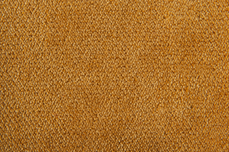 fabric texture yellow carpeting for backgroundの写真素材