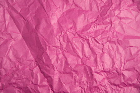 Crumpled pink paper texture for backgroundの写真素材