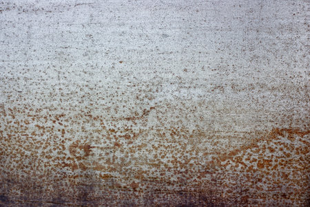 Dark gray and brown old rusty grunge metal textured backgroundの写真素材