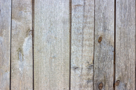 Simple old natural grunge rustic gray wooden texture background with cracks and scratches