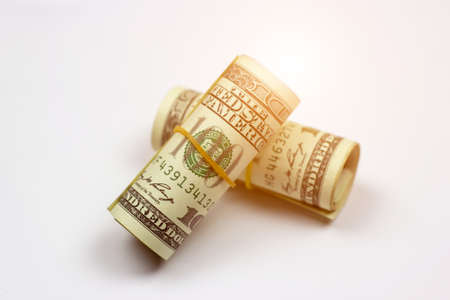 Money roll dollars usa on white background. Financial concept.の写真素材