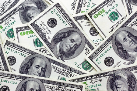 American hundred dollar bills as a money background. Business concept.