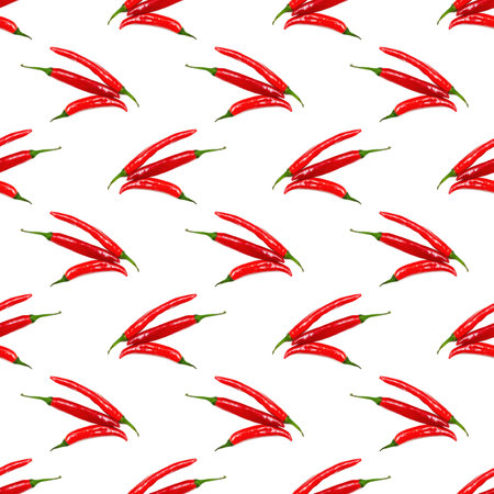 Red chili pepper repeat seamless pattern on white background.の写真素材